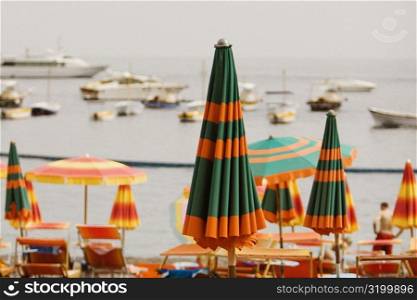 Beach umbrellas on the beach, Spiaggia Grande, Positano, Amalfi Coast, Salerno, Campania, Italy