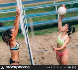 Beach Volleyball Female Player on the Net