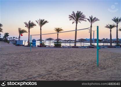 Beach volleyball field on a red sea beach at sunrise in hurghada city. Beach volleyball field