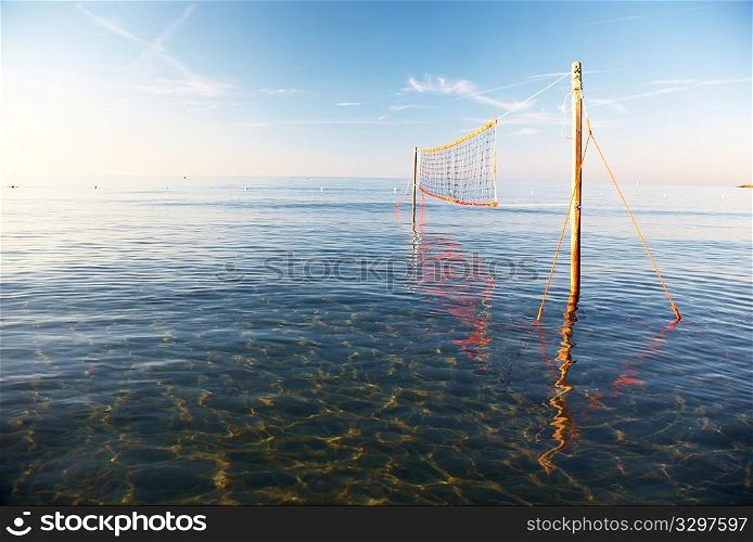 Beach Volleyball net in low water, horizontal frame