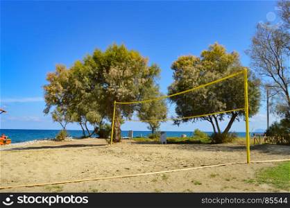 Beach volleyball on the sand . Beach volleyball on the sand of Maleme beach in Crete