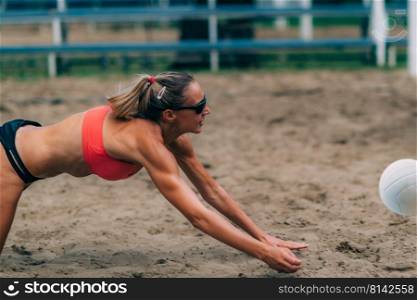 Beach Volleyball Player Hitting the Ball