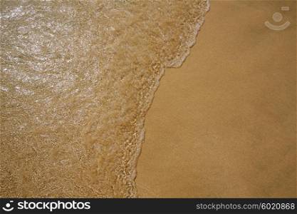 Beach water and sand texture background in Canary Islands