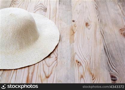 beach white hat on clear pine wood like Mediterranean style