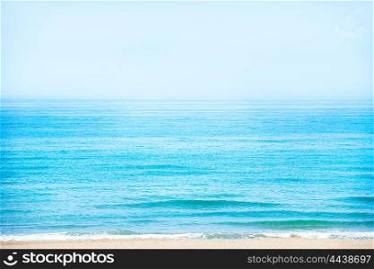 Beach with calm blue sea and clear sky as nature background