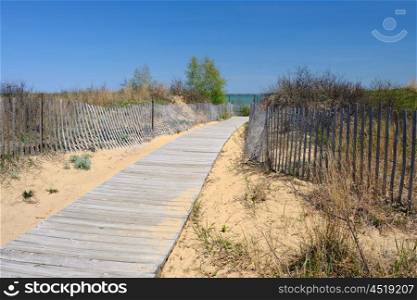 Beach with wooden fence at Lake Huron, Michigan, USA