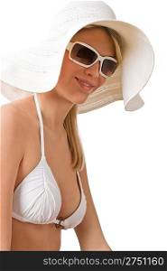 Beach - woman in bikini with hat and sunglasses sunbathing on white background