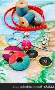 Beads and tools for needlework on bright colorful background. Beads for jewelry