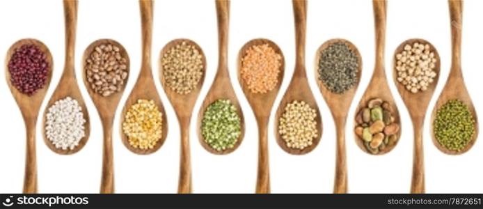 beans, lentils and pea - a collection of food ingredient on isolated wooden spoons