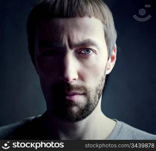 bearded man portrait, lit from the side