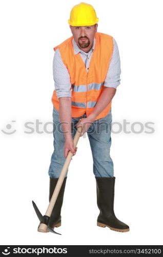 Bearded worker with pick-ax
