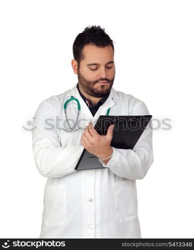 Bearded young doctor with a clipboard isolated on white background