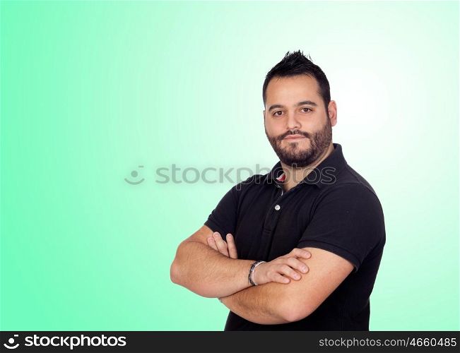 Bearded young men in black isolated on green background