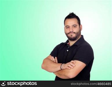 Bearded young men in black isolated on green background