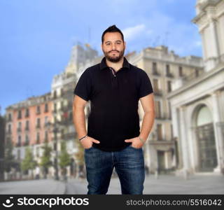 Bearded young men walking on the city street