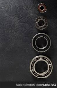 bearings tool on black background texture