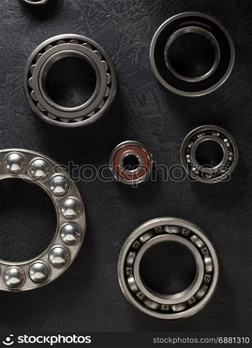 bearings tool on black background texture