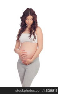 Beatiful pregnant woman isolated on a white background