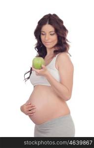 Beatiful pregnant woman with a apple isolated on a white background
