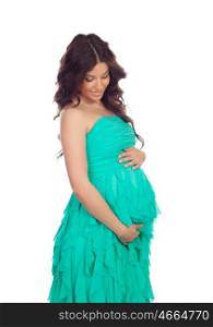 Beatiful pregnant woman with green dress isolated on a white background