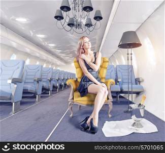 Beatiful woman in the luxury armchair in an airplane cabin. 3d creativity concept