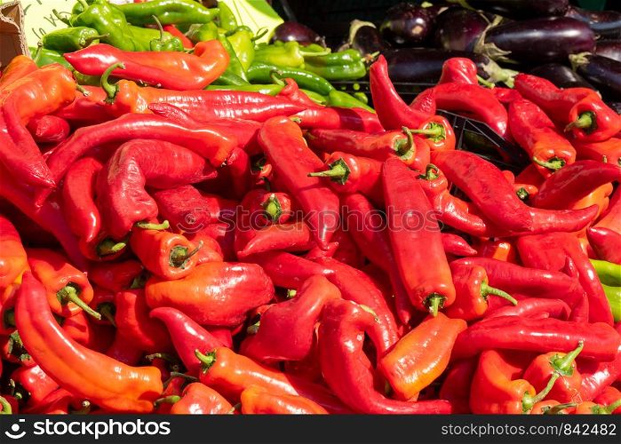 beauiful red peppers on the market