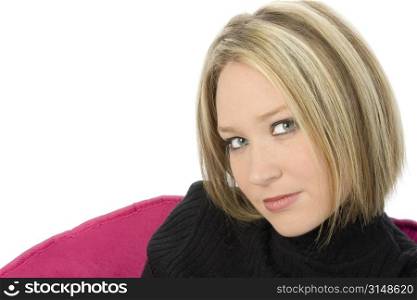 Beautfiul young woman with short blonde hair. Wearing black turtle neck shirt. Shot in studio over white.