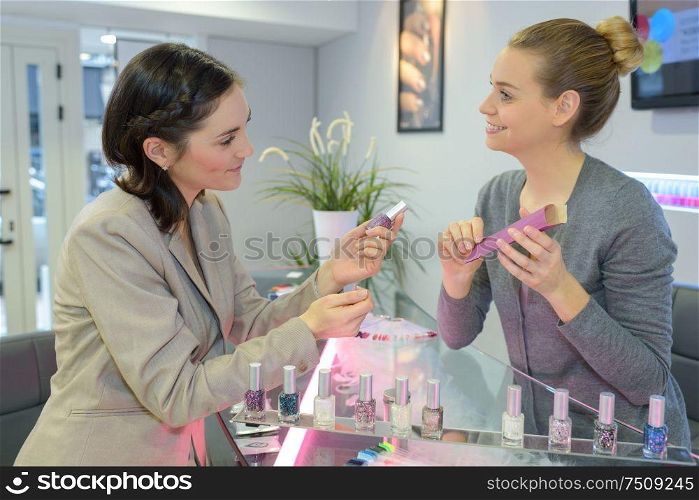 beautician advises client
