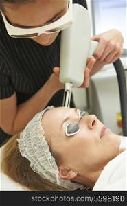 Beautician Carrying Out Fractional Laser Treatment