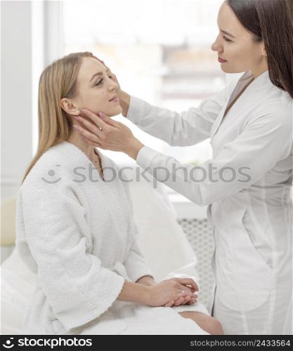 beautician woman clinic consults client 3