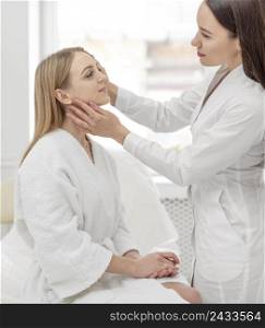 beautician woman clinic consults client 3
