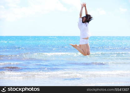beautifel and happy woman girl on beach have fun and relax on summer vacation over the beautiful tropical sea