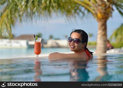 beautifu and happy woman girl on beach have fun and relax on summer vacation over the sea
