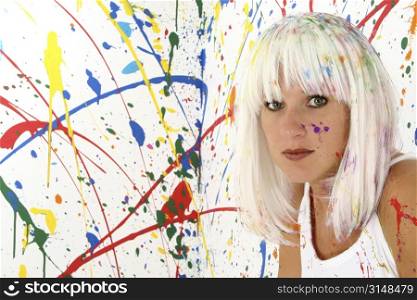 Beautiful 29 year old woman with white hair, white dress, covered in paint.
