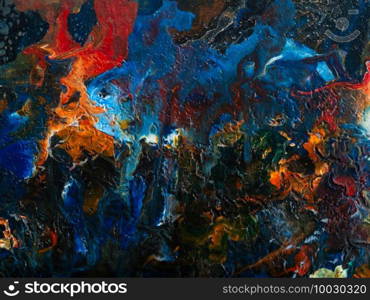 Beautiful abstract background. Pouring acrylic paint on canvas. Contemporary art.