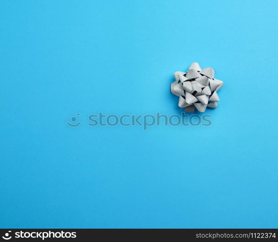Beautiful abstract blue design template with silver bow. Luxury design. Holiday background