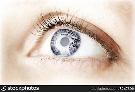 Beautiful abstract blue eye, female face part, healthy vision, extreme closeup