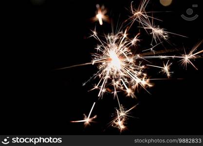 Beautiful abstract shot of sparklers on black background.