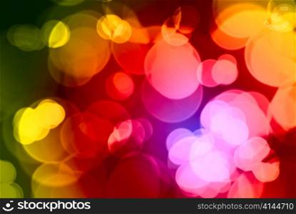 Beautiful abstract warm color background of holiday lights