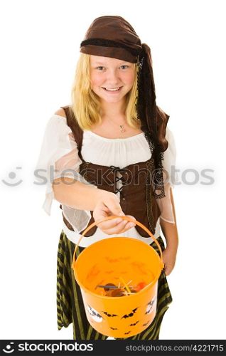 Beautiful adolescent girl dressed as a pirate for halloween, holding out her bucket for candy. Isolated on white.