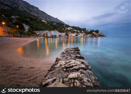 Beautiful Adriatic Beach and Mimice Village on Omis Riviera in the Evening, Dalmatia, Croatia