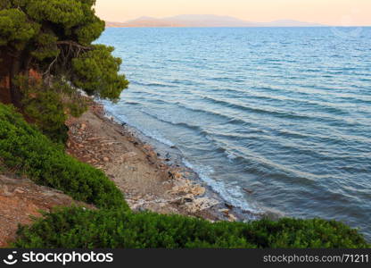 Beautiful Aegean sea coast sunset landscape (Metamorfosi, Sithonia, Halkidiki, Greece).