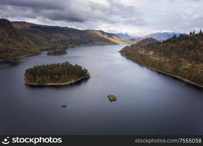 Beautiful aerial drone landscape image of glorious Autumn Fall sun over Thirlmere in Lake District