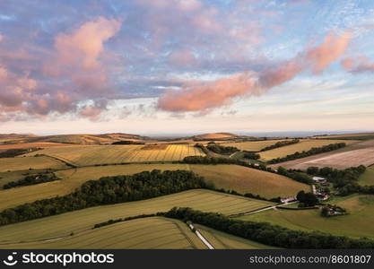 Beautiful aerial drone landscape image of South Downs NP at sunrise in Summer