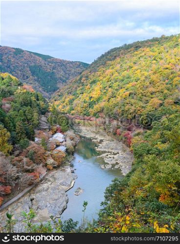 Beautiful aerial scenery of Asashiyama mountain and Hozugawa river in autumn season, Kyoto, Japan