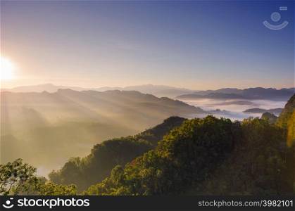 Beautiful aerial view landscape sunbeam with fog at morning, Baan jabo viewpoint. Mae Hong Son, Baan JABO one of the most amazing Mist in Thailand.. Baan jabo viewpoint.