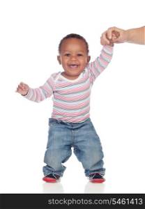 Beautiful African American baby learning to walk isolated on a white background