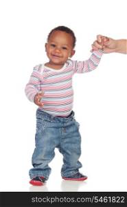 Beautiful African American baby learning to walk isolated on a white background