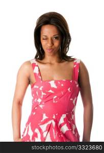 Beautiful African American business woman in pink with white spring summer halter dress wink and blink her eye, isolated.