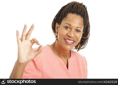 Beautiful African-American businesswoman giving the okay sign.